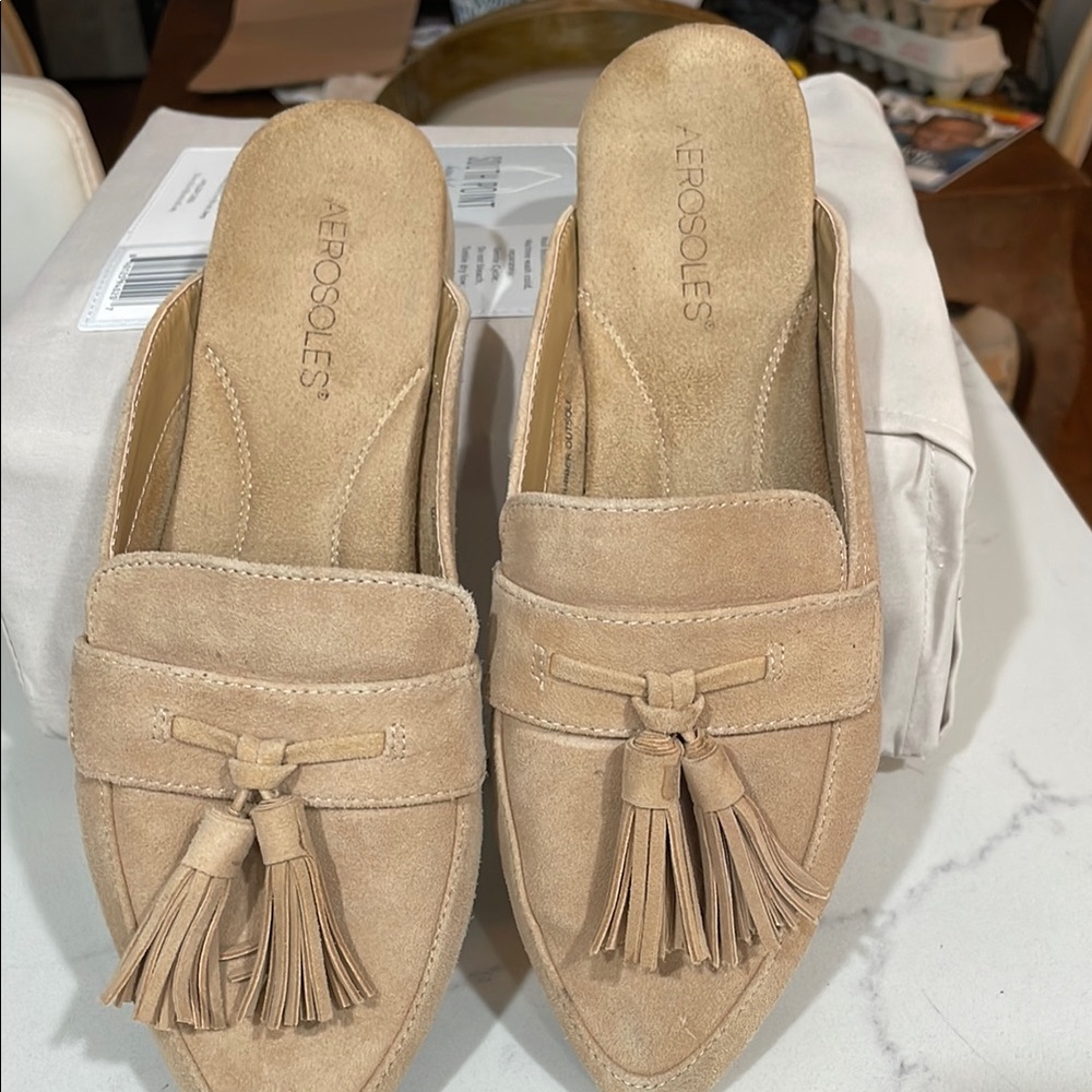 AEROSOLES Tan Mules with Decorative Tassel and Flat Sole
